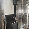 Печь Теплодар СИЕСТА 30 в бане с дымоходом MAGMA