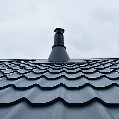Дымоход MAGMA на крыше дома